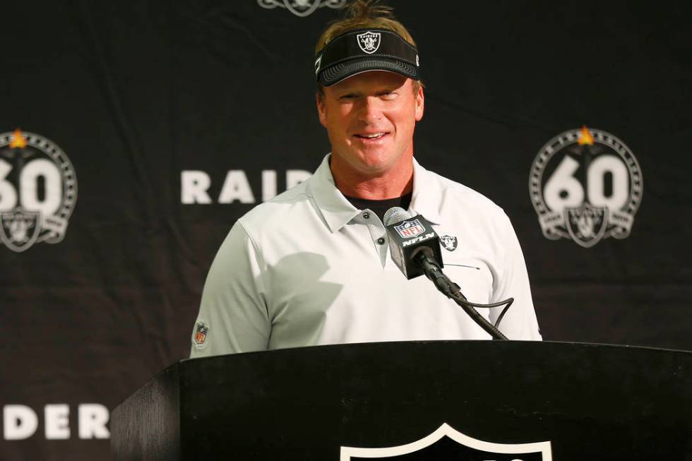 Oakland Raiders head coach Jon Gruden speaks at a news conference after an NFL football game ag ...