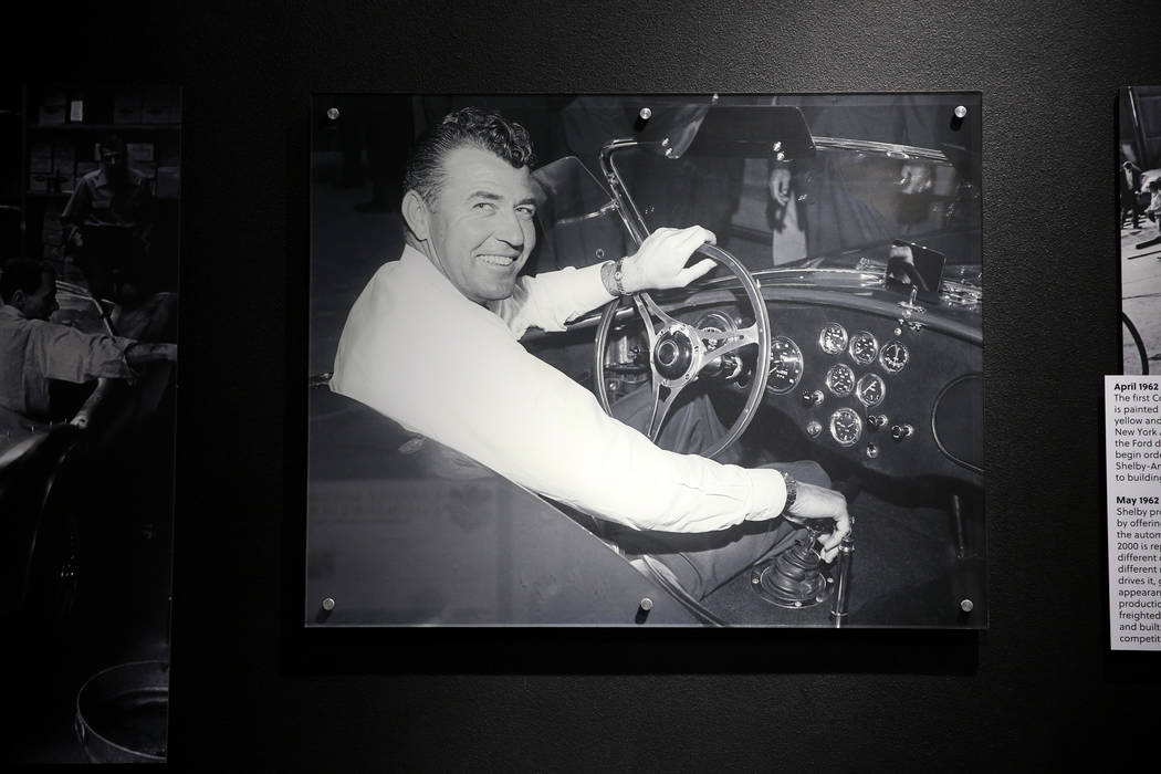 A 1962 photo of late car racing and car making legend Carroll Shelby in his first Cobra built i ...