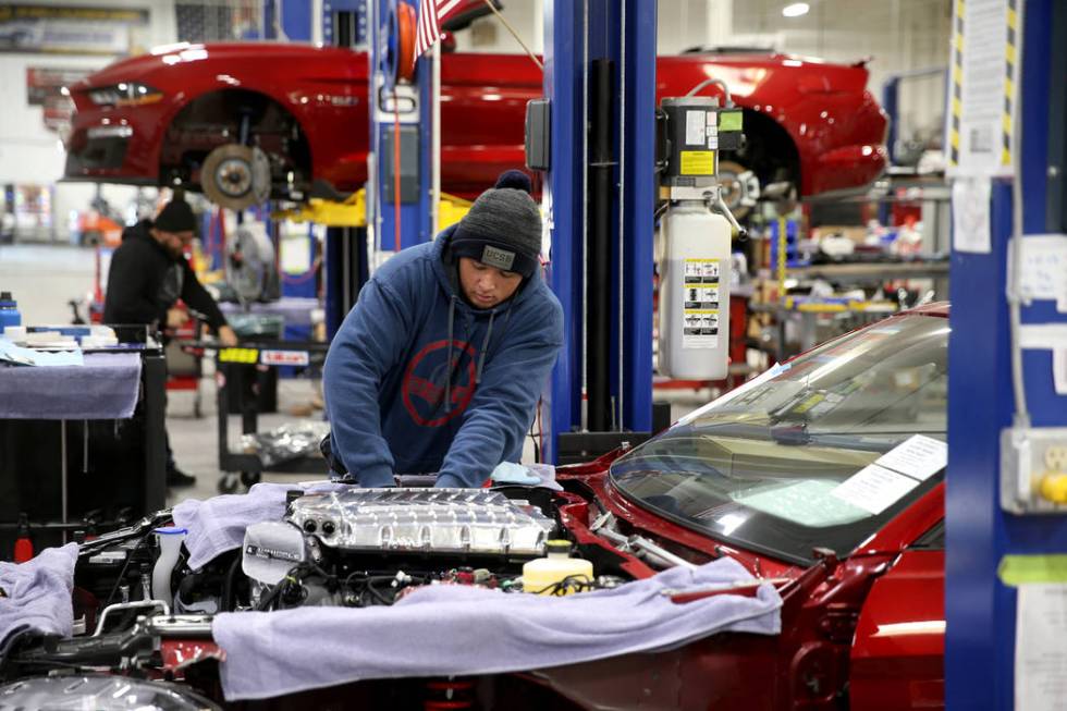 Oscar Ayala installs a Whipple Supercharger on a 2020 Ford Mustang as part of a conversion to a ...