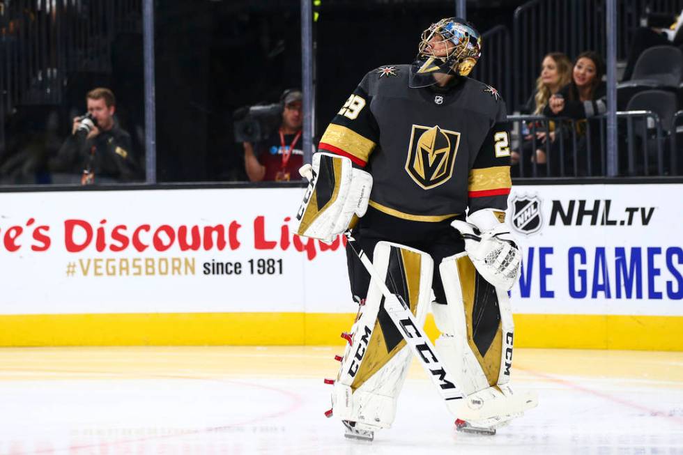 Golden Knights goaltender Marc-Andre Fleury (29) looks up after giving up a goal to the Boston ...