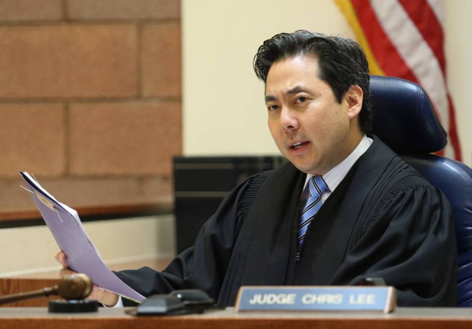 Justice of the Peace Chris Lee presides over a case in North Las Vegas Justice Court on May 21, ...