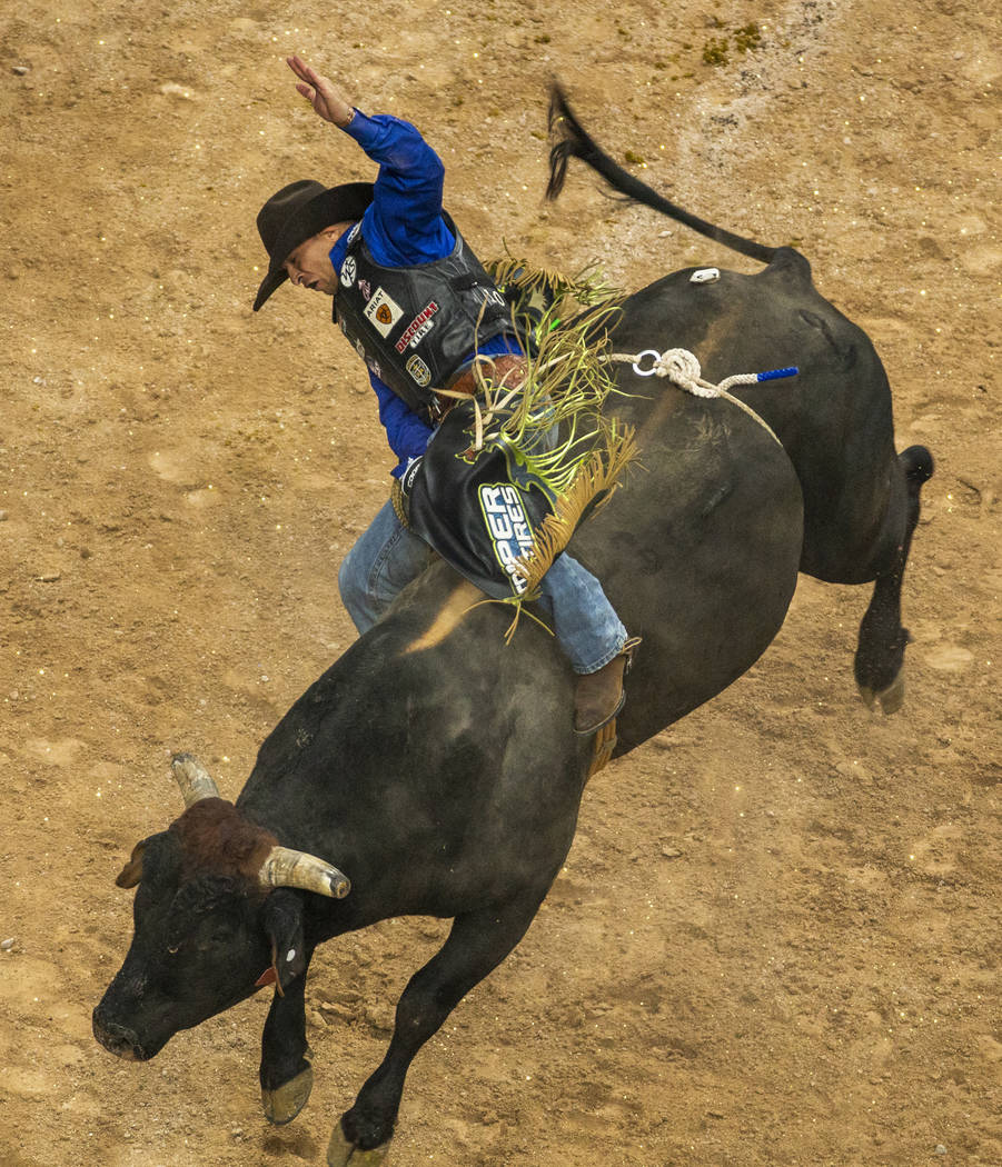 Eduardo Aparecido digs in on Chiseled during the PBR World Finals at T-Mobile Arena on Wednesda ...