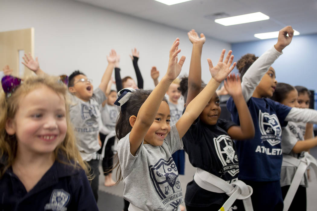 Second graders participate in their martial arts class at Pinecrest Academy, Nevada's newest ca ...