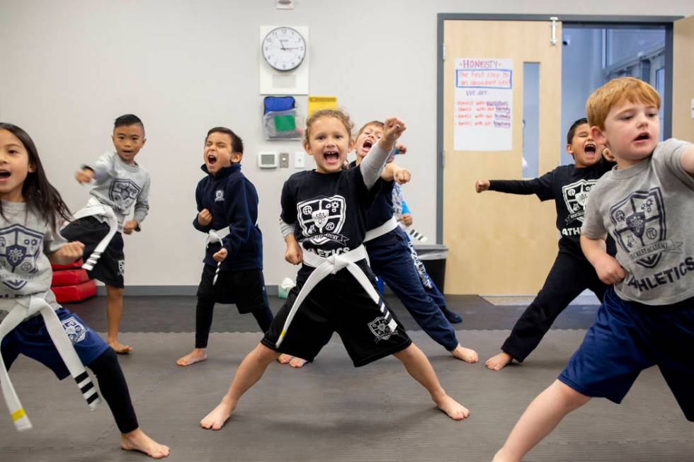 Second graders participate in their martial arts class at Pinecrest Academy, Nevada's newest ca ...
