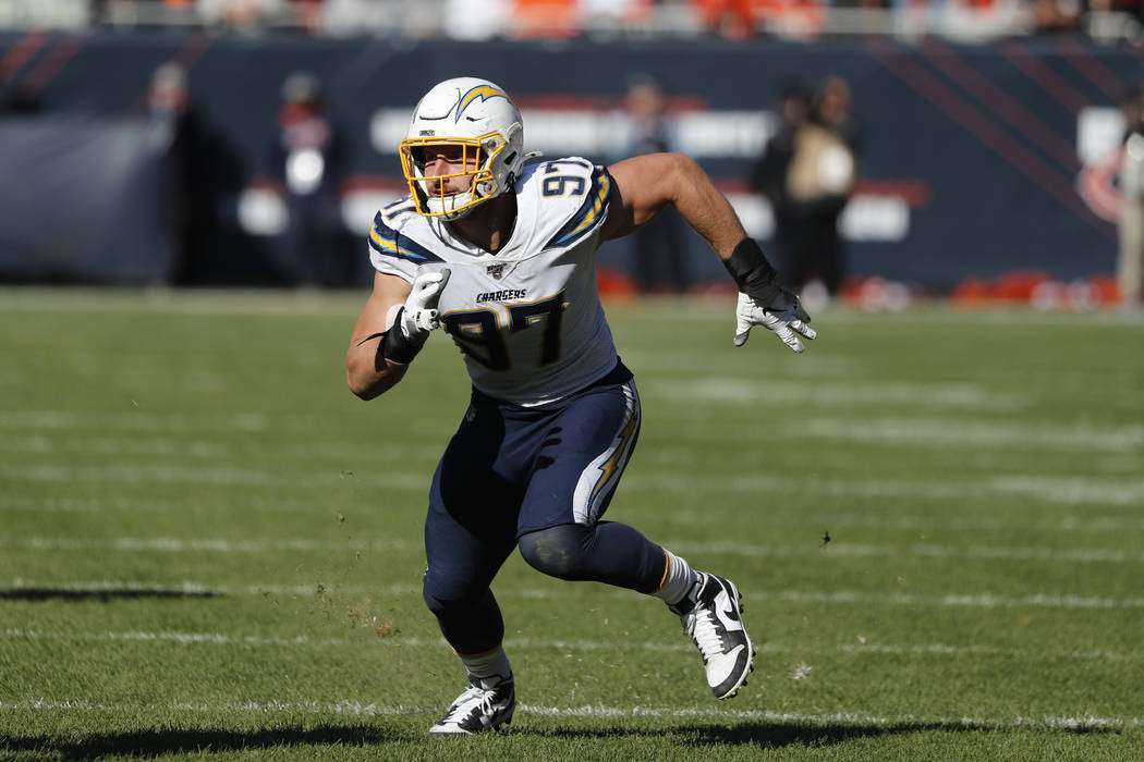 Los Angeles Chargers defensive end Joey Bosa rushes the quarterback during the second half of a ...