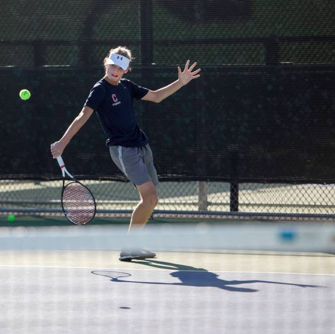 Coronado's Jason Elliot plays a singles match against Palo Verde's Axel Botticelli on Wednesday ...