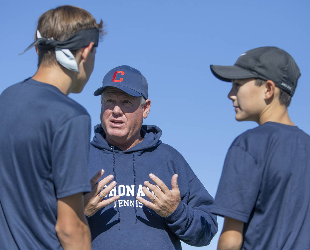Coronado Head Coach David Willingham speaks to players Ian Hawkes and Jack Wohlwend during thei ...