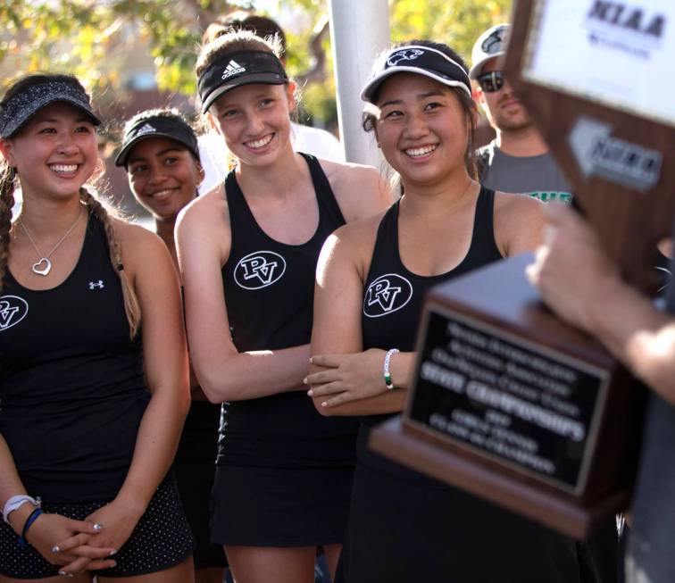 Palo Verde tennis players Mandalay Labarre, left, Caroline Lemcke, center, and Caroline Hsu, ri ...