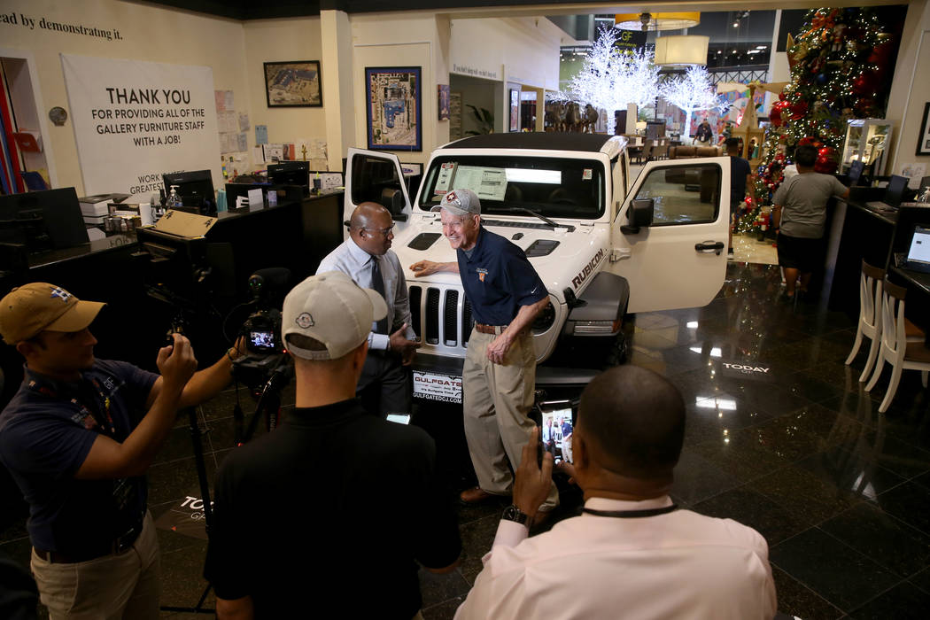 Houston furniture store owner Jim "Mattress Mack" McIngvale, 68, left, films a commer ...