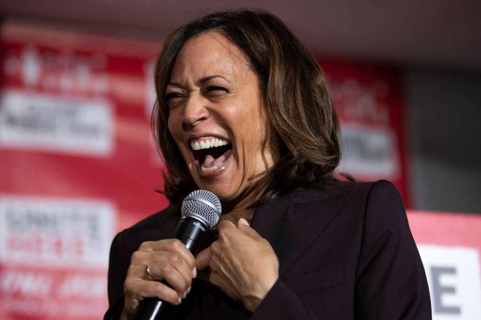 Presidential candidate Kamala Harris laughs while speaking to the crowd at a town hall hosted b ...