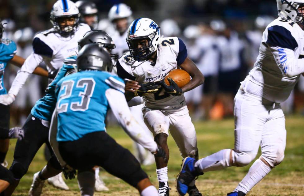 Foothill's Kendric Thomas (2) runs the ball during the second half of a 4A Desert Region footba ...