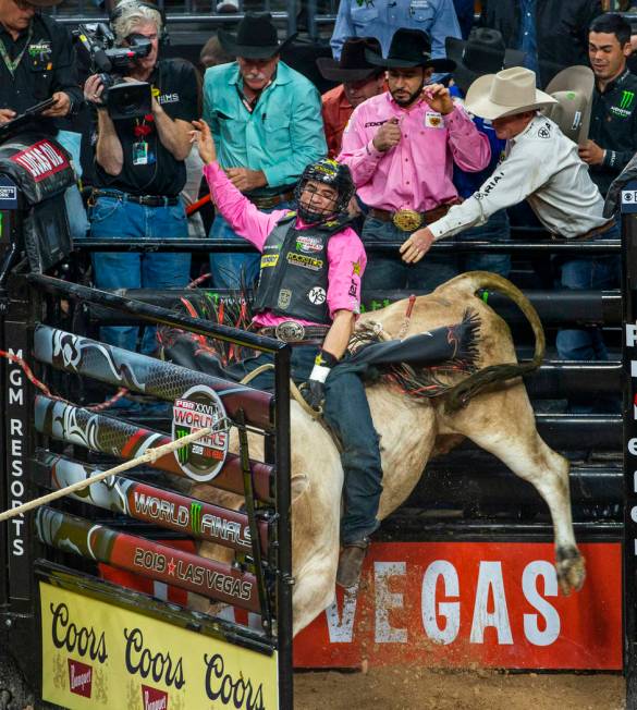 Ramon de Lima is already bucked by Ridin Solo as he leaves the gate during the third day of the ...