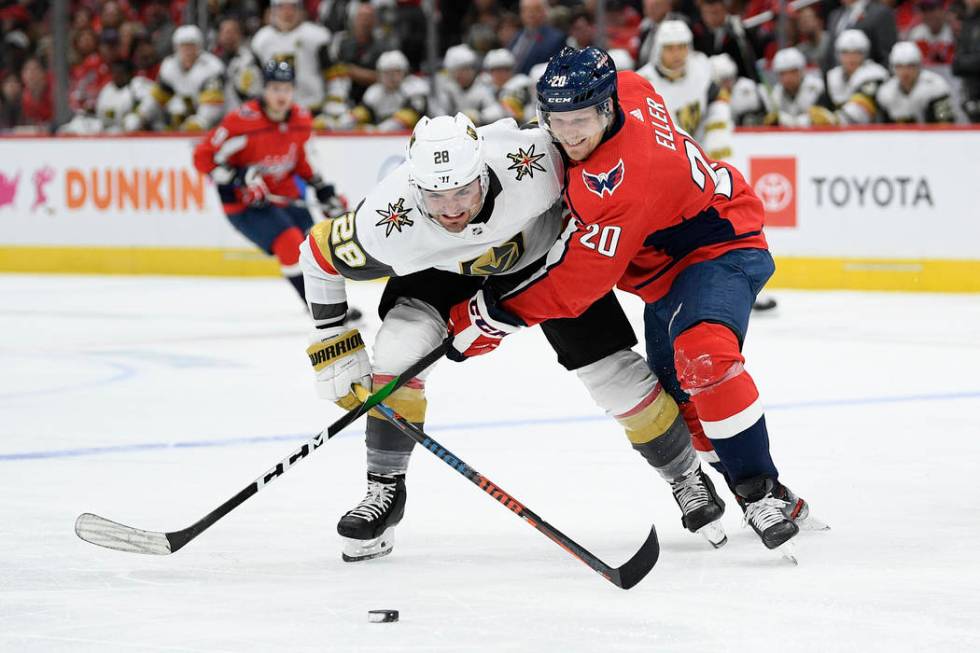 Washington Capitals center Lars Eller (20), of Denmark, and Vegas Golden Knights left wing Will ...