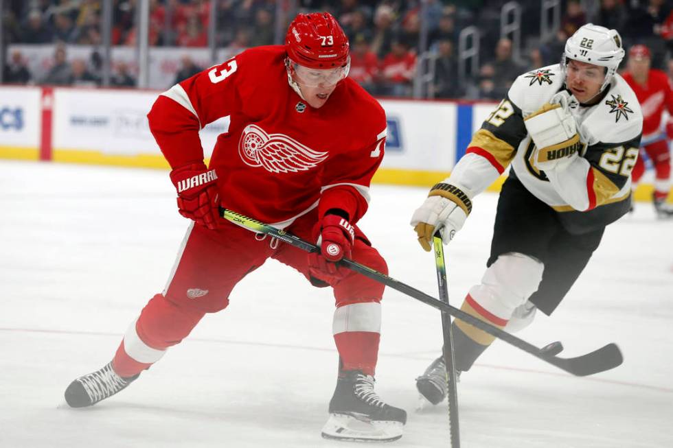 Detroit Red Wings left wing Adam Erne (73) shoots the puck past Vegas Golden Knights defenseman ...