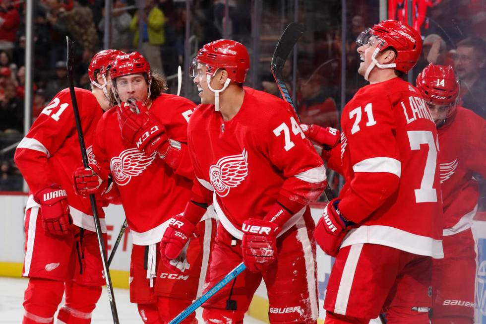 Detroit Red Wings defenseman Madison Bowey (74) is congratulated after scoring during the third ...