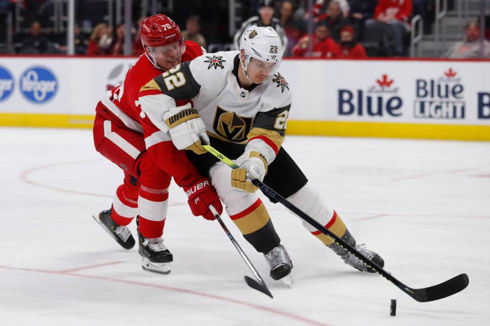 Detroit Red Wings center Christoffer Ehn (70) reaches in as Vegas Golden Knights defenseman Nic ...