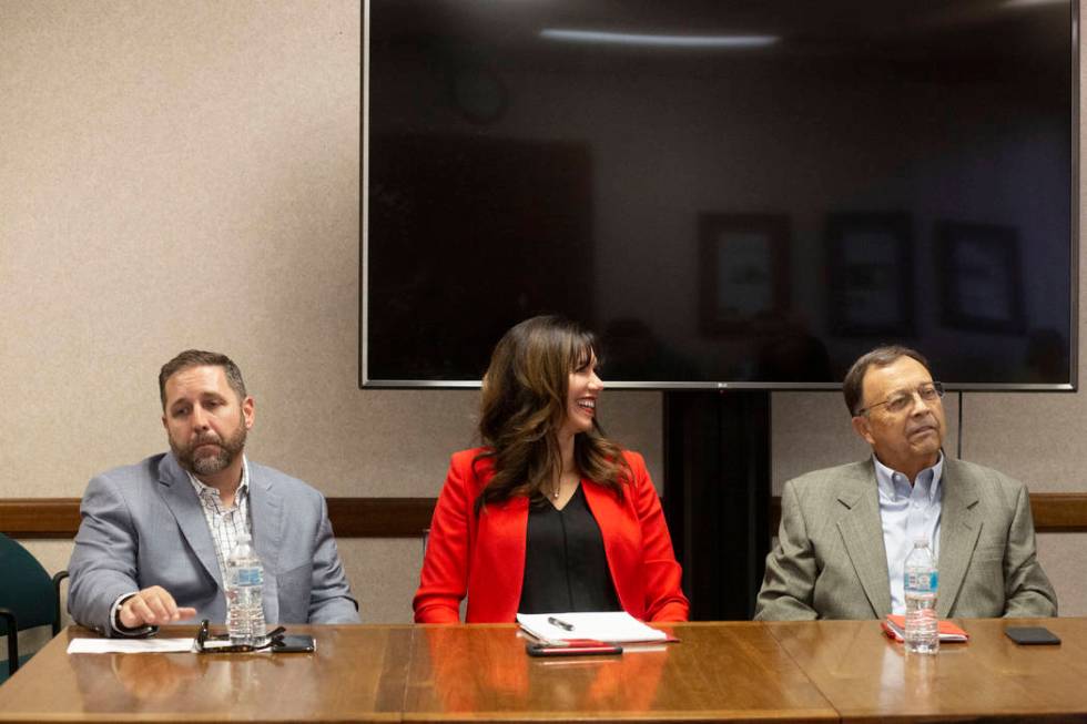 Las Vegas Bowl executive director John Saccenti, left, UNLV athletic director Desiree Reed-Fran ...