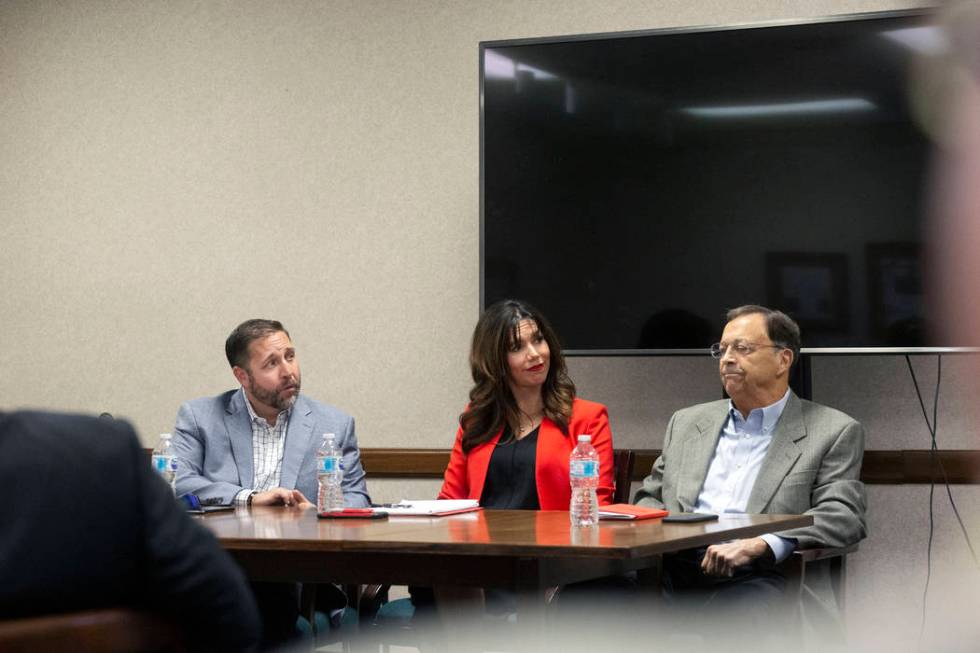 Las Vegas Bowl executive director John Saccenti, left, UNLV athletic director Desiree Reed-Fran ...