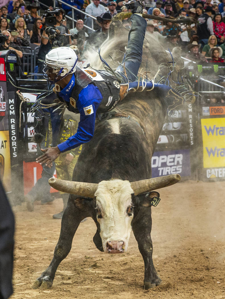 Ezekiel Mitchell is bucked forward off of Shownuff during the final round on the last day of th ...