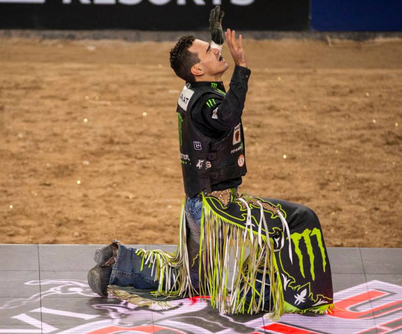 Jose Vitor Leme gives thanks after a successful ride atop of Cochise during the last day of the ...