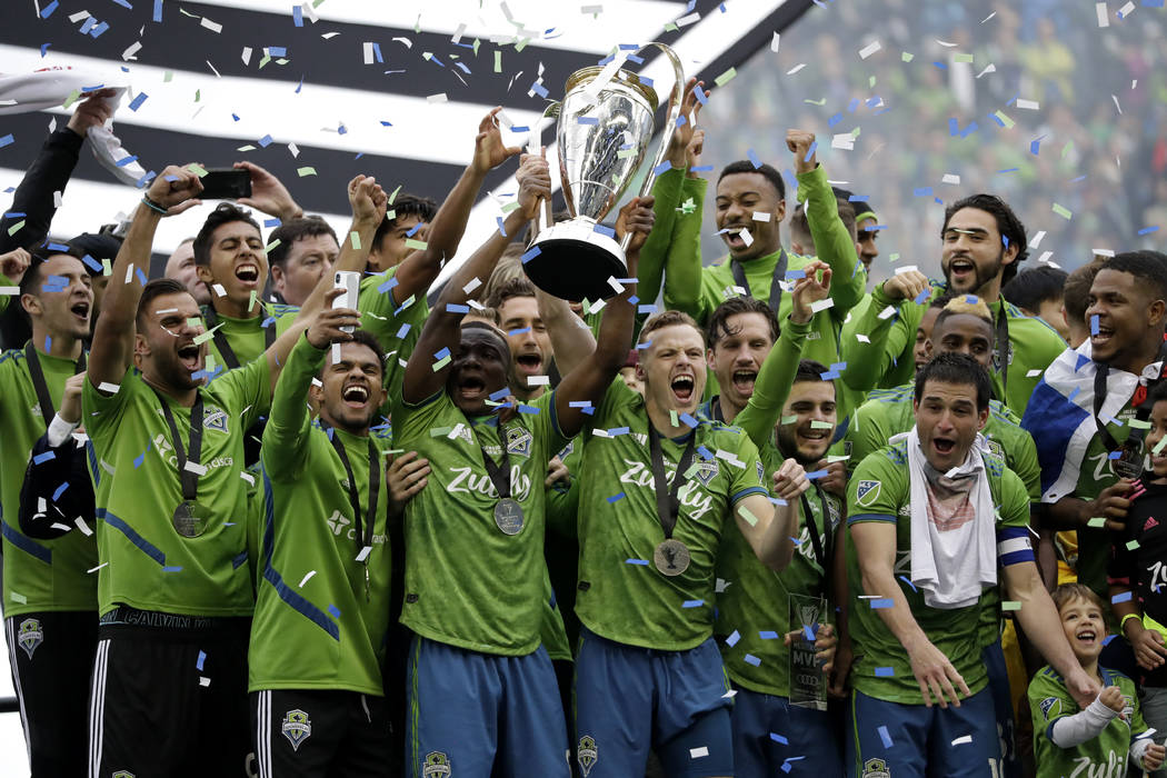 Seattle Sounders celebrate Sunday, Nov. 10, 2019, after the team beat the Toronto FC in the MLS ...