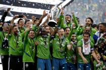 Seattle Sounders celebrate Sunday, Nov. 10, 2019, after the team beat the Toronto FC in the MLS ...