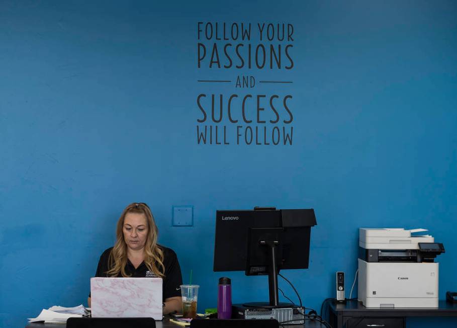 Michelle King, part-time registrar, works at her desk at Acceleration Academy in Las Vegas, Sun ...