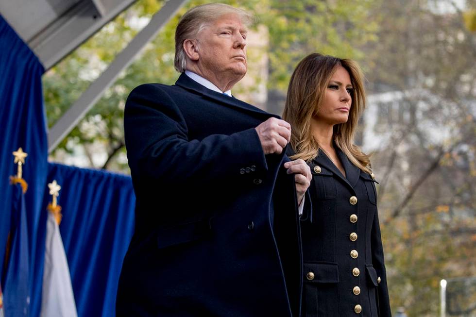 President Donald Trump and first lady Melania Trump participate in a wreath laying ceremony at ...