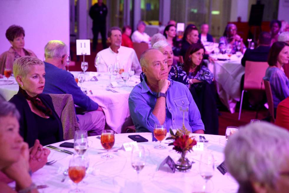 Guests, including Nora Kraidman and her husband Amit Kraidman, of Las Vegas, listen during Deat ...