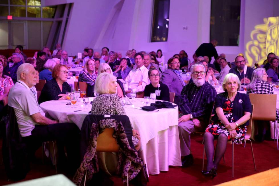 Guests listen during Death Over Dinner - Alzheimer's Edition in the Keep Memory Alive Event Cen ...