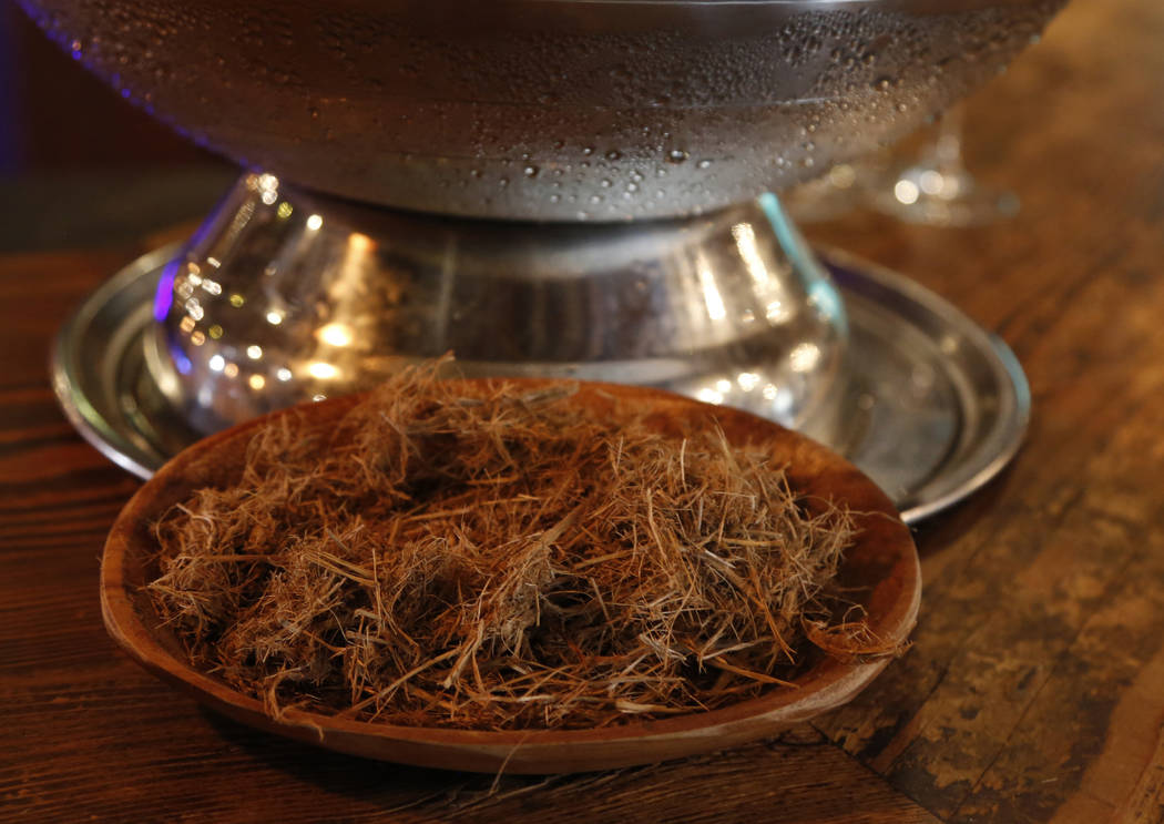 A sample of elephant dung is shown at a gin tasting session at the Botlierskop Private Game Res ...