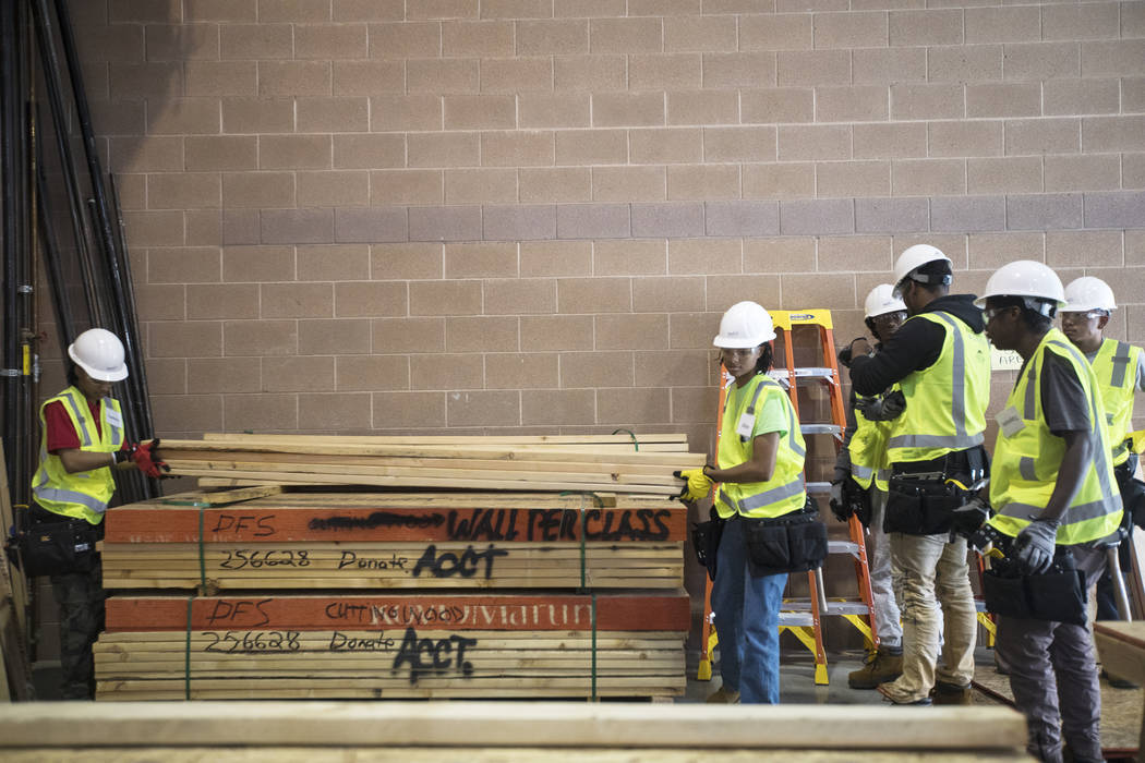 Participants in HomeAid WORKS, a program that teaches homeless youth construction skills for jo ...