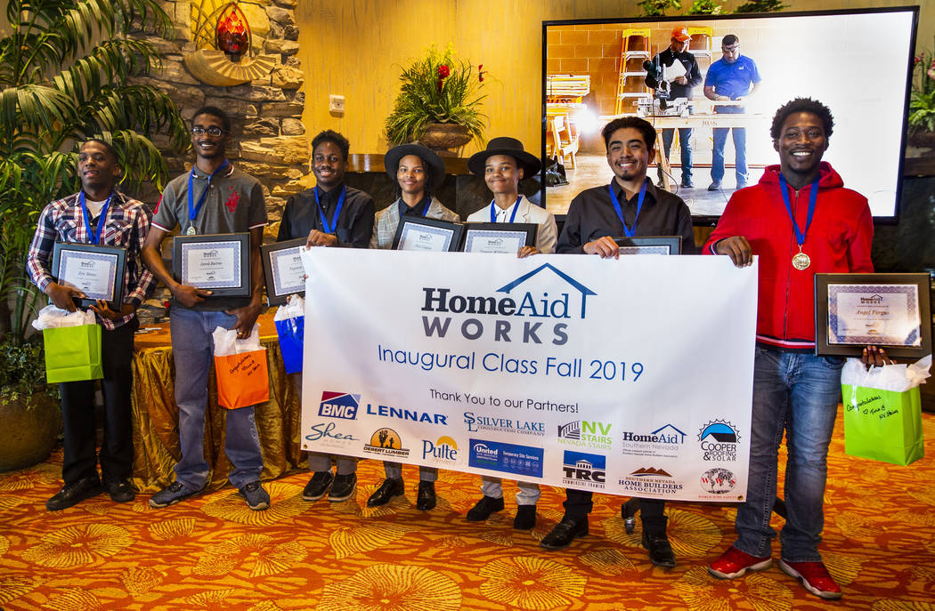 Members of the first graduating class of HomeAid WORKS, Eric Moore, from left, Jared Burrus, Ta ...