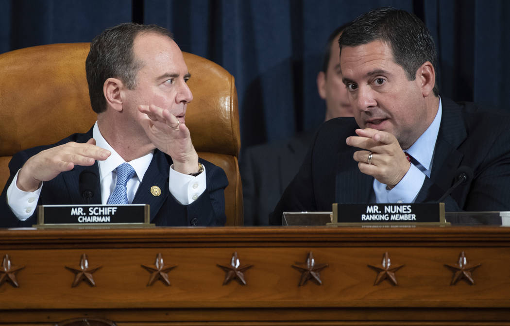 House Intelligence Committee Chairman Rep. Adam Schiff, D-Calif., left, talks with ranking memb ...