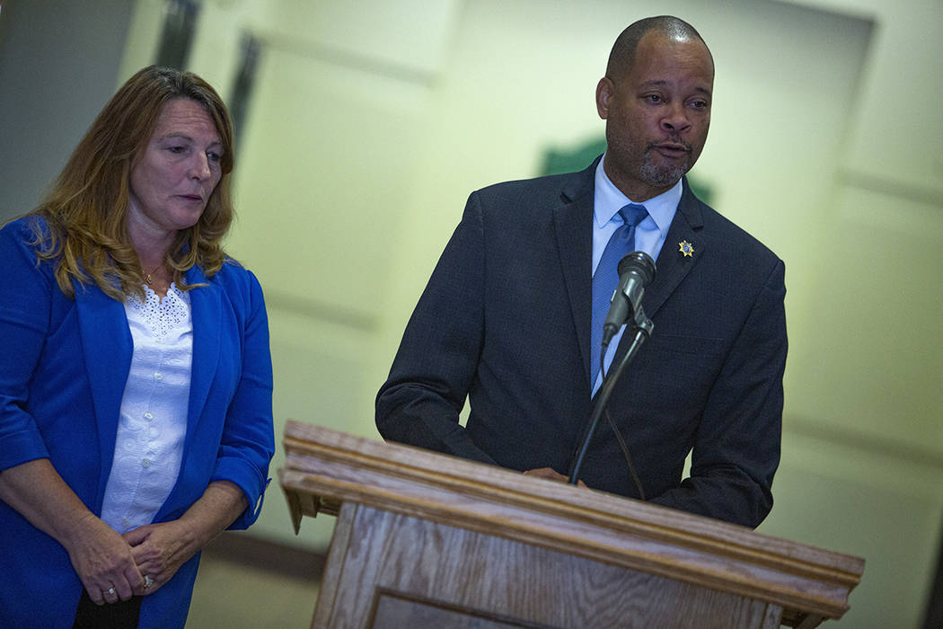 Nevada Attorney General Aaron Ford, right, speaks with Clark County Commissioner Marilyn Kirkpa ...