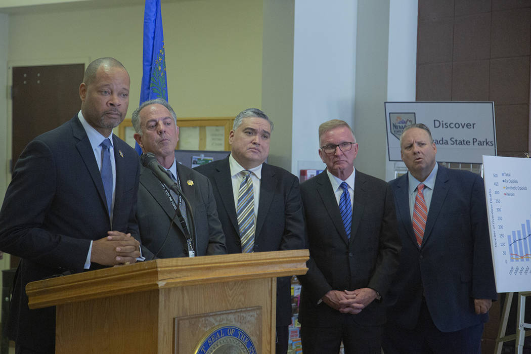 (From Left to Right) Nevada Attorney General Aaron Ford, answers questions, while Sheriff Joe L ...