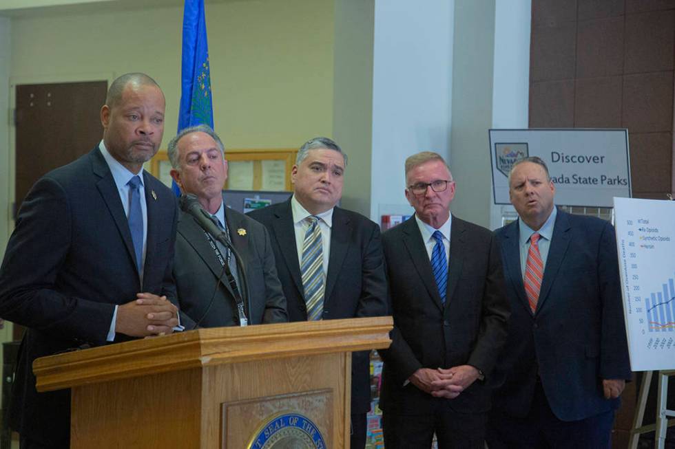 (From Left to Right) Nevada Attorney General Aaron Ford, answers questions, while Sheriff Joe L ...