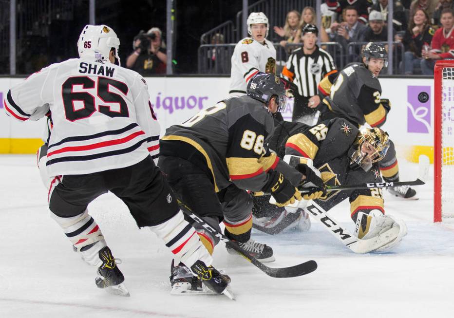 Vegas Golden Knights goaltender Marc-Andre Fleury (29) makes a diving save against Chicago Blac ...