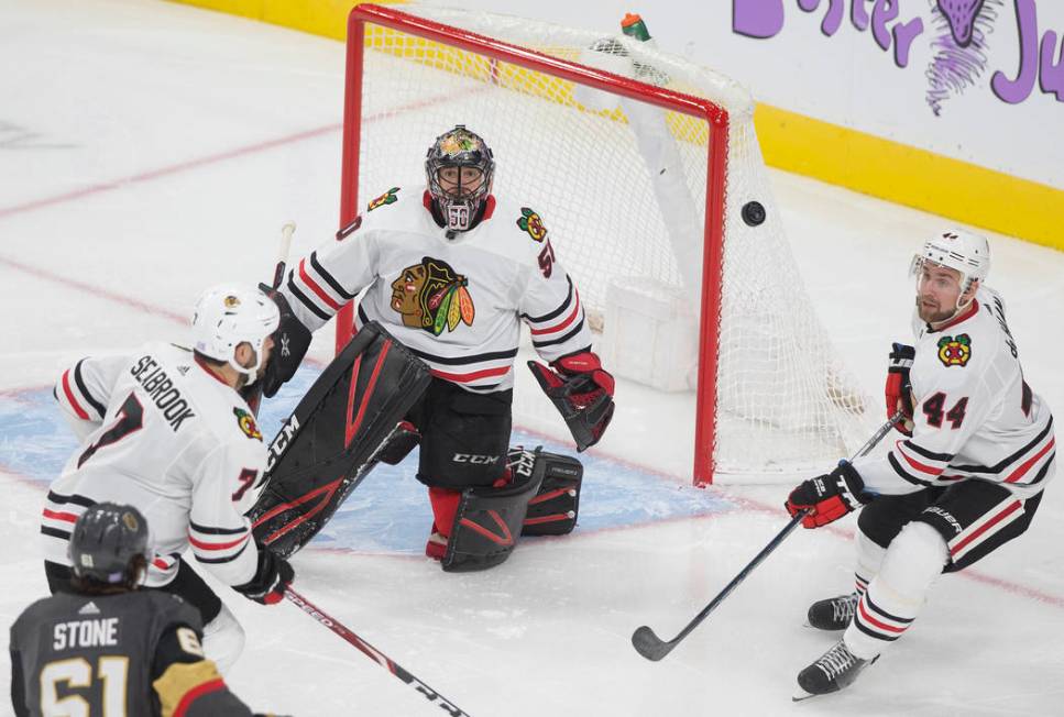 Vegas Golden Knights right wing Mark Stone (61) watches his shot on Chicago Blackhawks goaltend ...