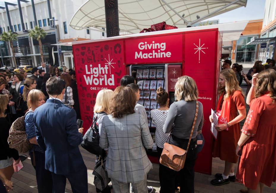 The Giving Machine, a vending machine that offers different items from charities a user can sel ...