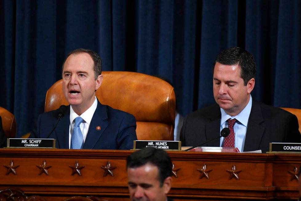 House Intelligence Committee Chairman Adam Schiff, D-Calif., left, and ranking member Rep. Devi ...