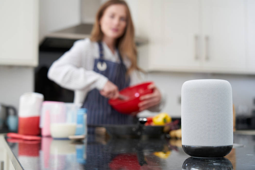 Cooking is easy with smart appliances and speakers. (Getty Images)