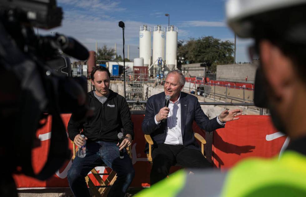 Steve Hill, right, Chief Executive Officer of the Las Vegas Convention and Visitors Authority, ...