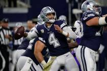 Dallas Cowboys quarterback Dak Prescott throws the ball during the second half of an NFL footba ...