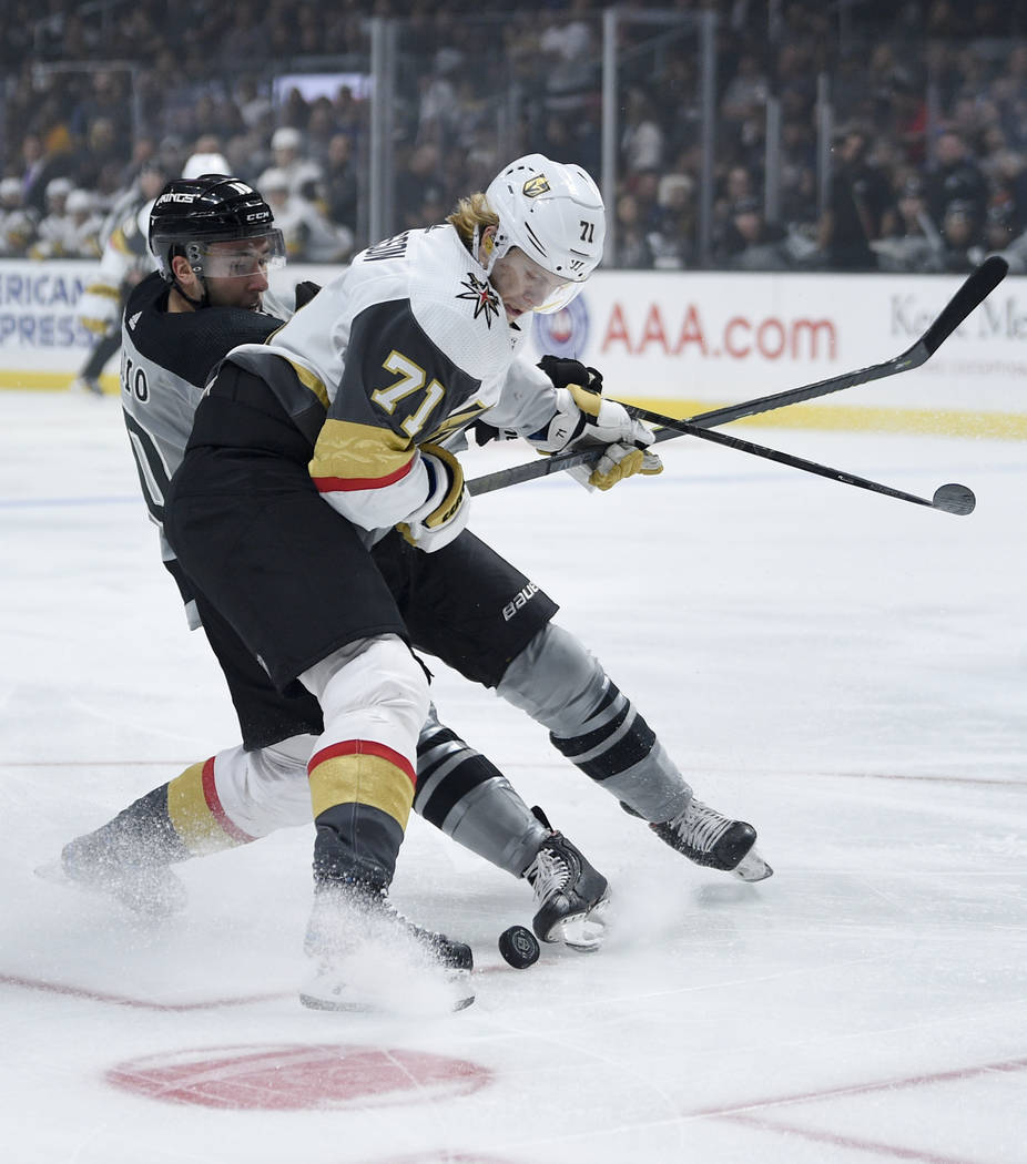 Vegas Golden Knights center William Karlsson, right, and Los Angeles Kings center Michael Amadi ...