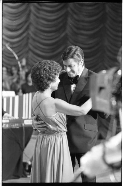 Jerry Lewis dances with an unidentified woman during the 15th annual Jerry Lewis Labor Day Tele ...