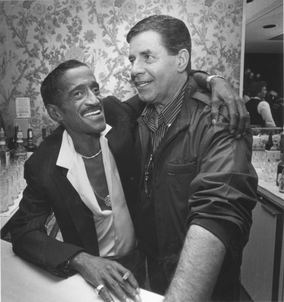 Sammy Davis Jr., and Jerry Lewis are shown on the opening night of their show at Bally's in an ...