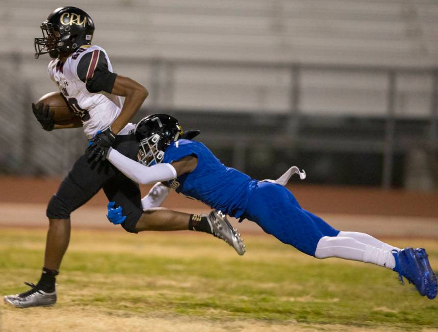 Faith Lutheran junior wide receiver Quenton Rice (80) sprints towards the end zone with Desert ...