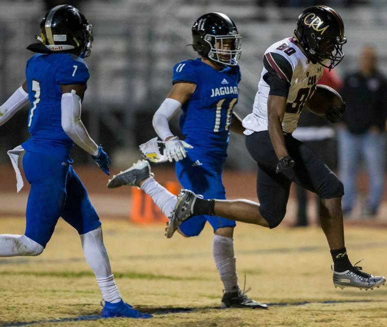 Faith Lutheran junior wide receiver Quenton Rice (80) skips into the end zone after making a to ...