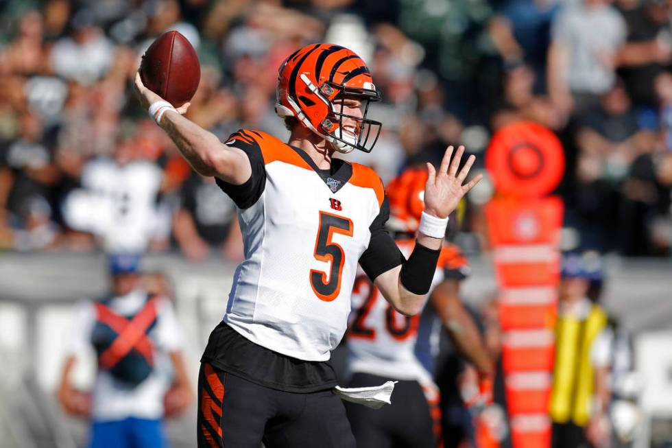 Cincinnati Bengals quarterback Ryan Finley throws during the first half of an NFL football game ...